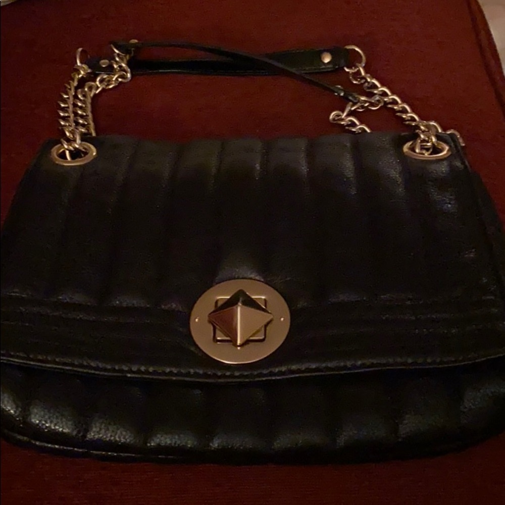 Kate spade quilted leather turn key lock gold